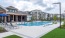 a swimming pool in front of a building