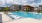 a swimming pool in front of a building