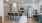 a kitchen with a dining table and chairs